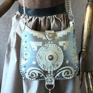 Modern western cross body